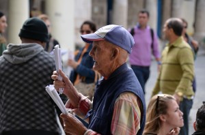Old man selling nuts