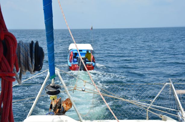 being pulled by fishing boat